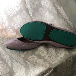 Lavender Patent leather Tieks.